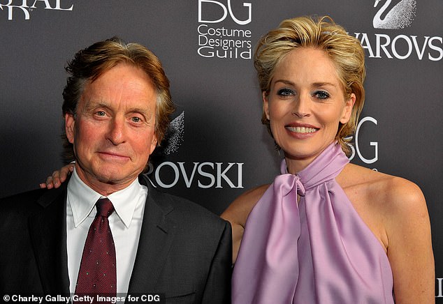 The writer's comments last month came weeks before Stone, 67, lambasted the reboot during a chat on The Today Show. She said: 'It goes the way the one that I was in. I would just say, ¿"Why do you do it?¿ Go ahead, but good f*****g luck.¿' - pictured 2009 with Douglas