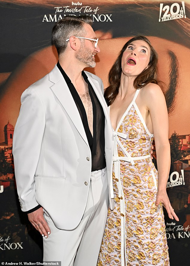 Despite the bleak nature of the show, Amanda sported a floral summer dress accentuated with bow-tie detailing, while her husband Christopher Robinson sported a trendy mesh blouse worn under a light grey suit