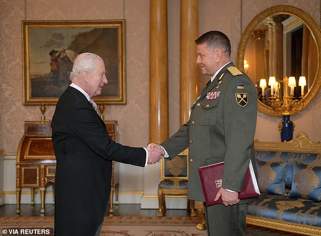 General Valerii Zaluzhnyi, Ambassador of Ukraine, presents his credentials to Britain's King Charles III during a private audience at Buckingham Palace, London, February 2025