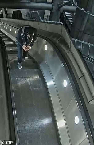 He reached into the victim's coat pocket and stole her wallet before getting off of the escalator at the bottom and immediately getting the escalator back up.