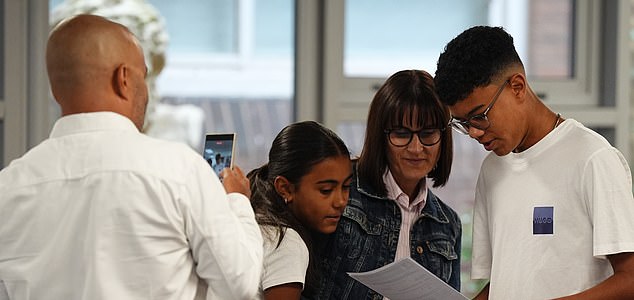 Pupils at Solihull School in Solihull receiving their GCSE results. Hundreds of thousands of pupils in England, Wales and Northern Ireland are receiving grades to help them progress to sixth form, college or training. Picture date: Thursday August 21, 2025. PA Photo. Photo credit should read: Jacob King/PA Wire