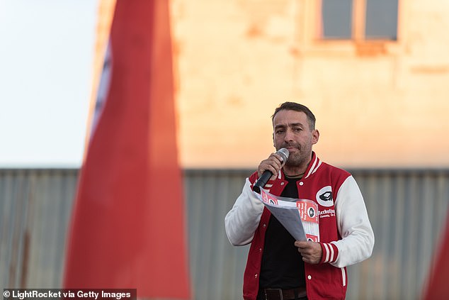 Pictured: The right-wing extremist Sven Liebich seen speaking during a protest against Merkel's visit to Chemnitz, Deutschland in 2018  before changing gender