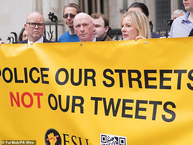 Ray Connolly (centre) with supporters outside the Court of Appeal at the Royal Courts of Justice in central London