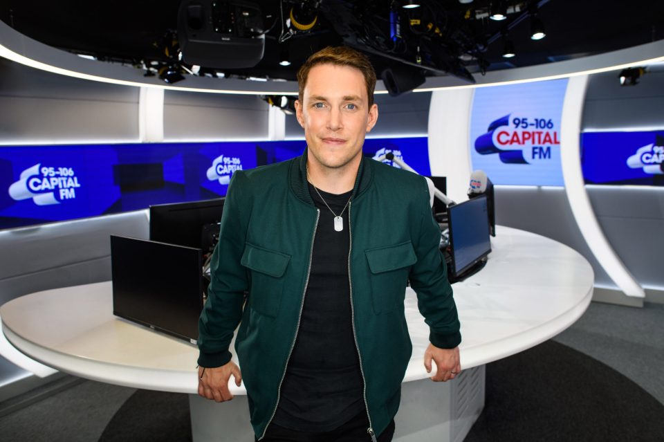 Man standing at Capital FM studio.