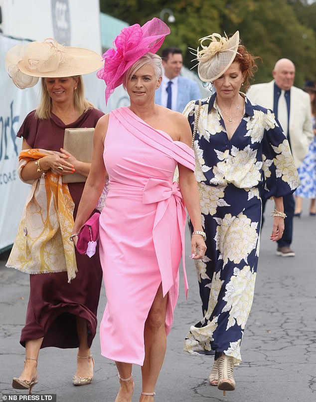 Many opted for bright and bold colours - such as hot pink - to add more energy to the otherwise gloomy weather