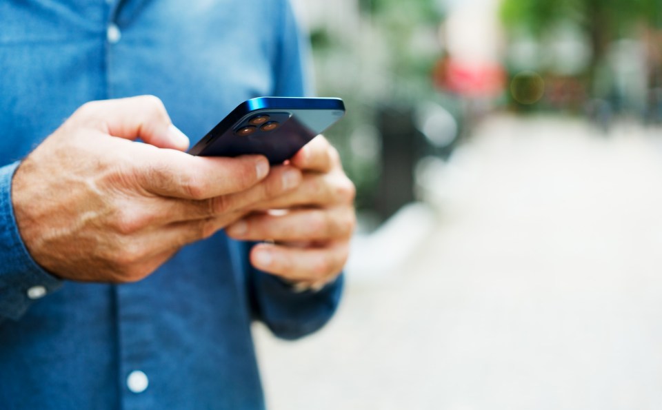Close-up of a person using a smartphone.