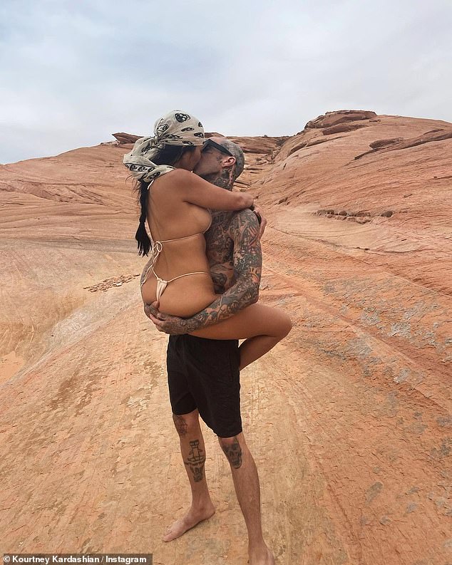 As Kourtney wrapped herself around Travis in the passionate display, captioning the photograph as 'just like heaven', in a post which reached £5million likes