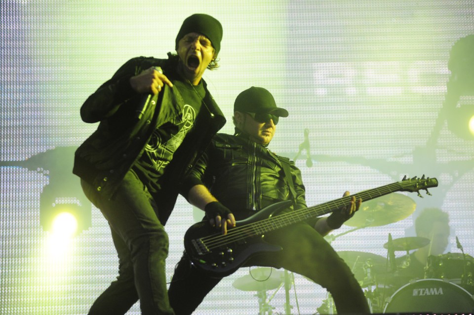 Pendulum performing live on stage.