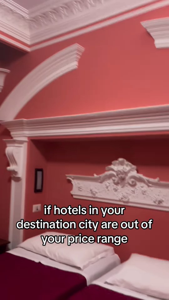 Room with two beds and ornate headboard; text overlay: "if hotels in your destination city are out of your price range"