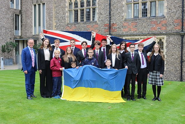 Lisa Minenko and other Ukrainian scholarship pupils at Brighton College with (on left) principal Richard Cairns