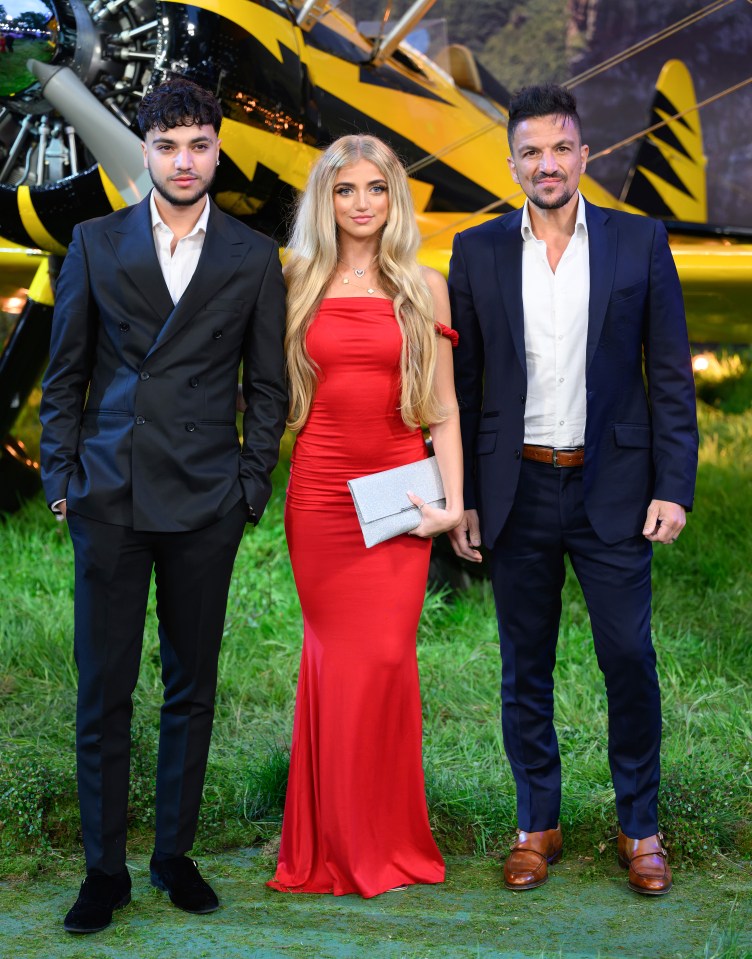 Junior, Princess, and Peter Andre at a premiere.