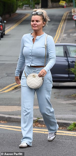 Kerry appeared in good spirits on Thursday afternoon as she departed the Oxford Natural Longevity & Aesthetics Clinic in Alderley Edge, Cheshire after receiving an Abarghouei vitamin C facial