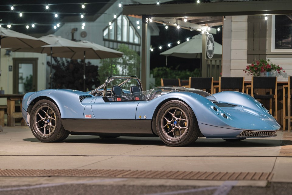 Light blue Nichols Cars N1A supercar at night.