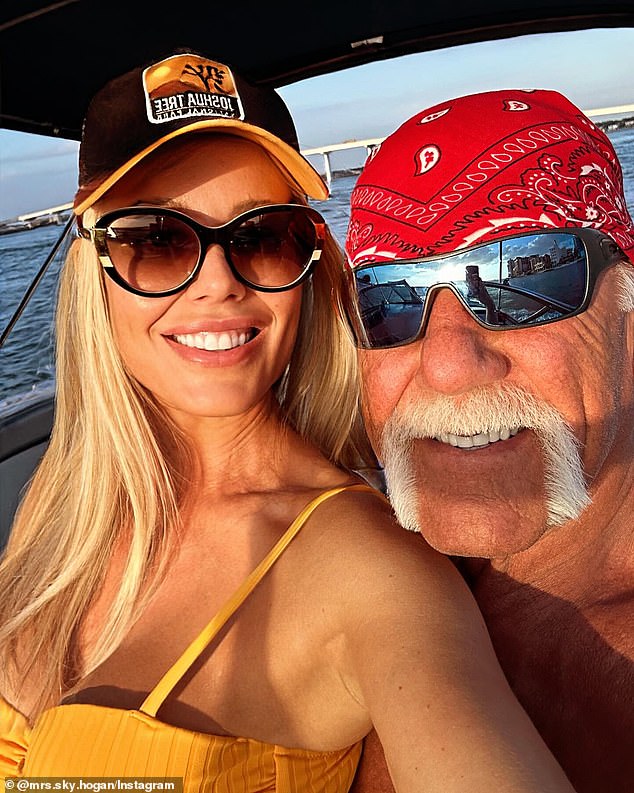 The WWE legend, pictured with his third wife Sky Daily, died at the age of 71 on July 24