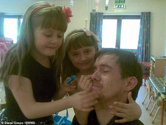 The former security guard was gunned down outside a pizza takeaway in Wakefield on August 12 (pictured: Mr Stogden with his two daughters, Alyssa, left, and Piper, centre)