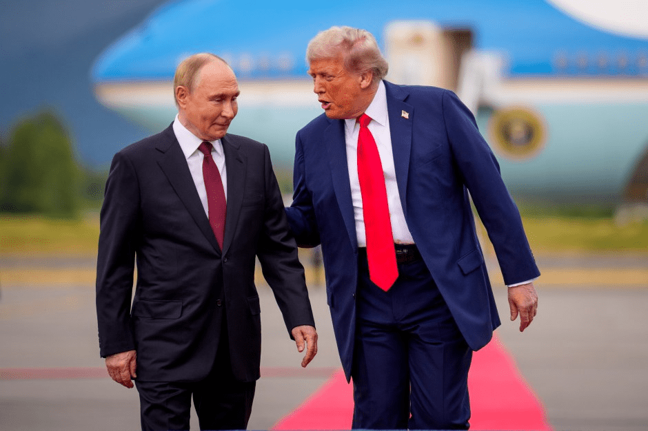Putin and Trump walking and talking.