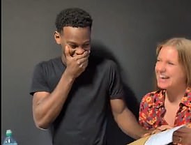 A student celebrates his results