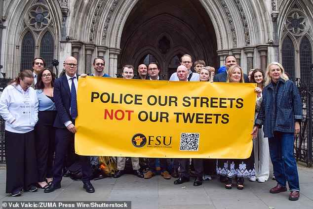 Pictured: Members of the Free Speech Union and supporters outside the Royal Courts of Justice ahead of Lucy Connolly's appeal