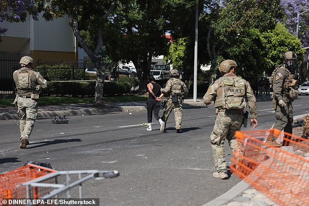 A protester is arrested in Los Angeles clashing with federal agents over President Donald Trump's Immigration and Customs Enforcement actions. Trump campaigned on deporting illegal immigrants but people in the U.S. legally are now being scrutinized as well