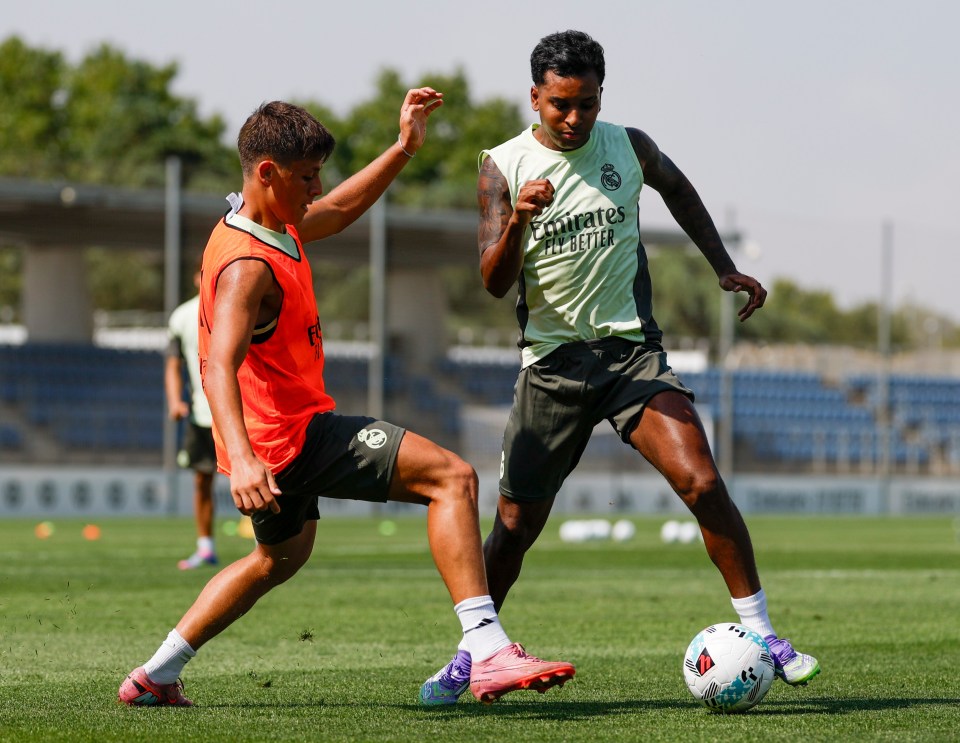 Rodrygo Goes and Arda Güler of Real Madrid during soccer training.