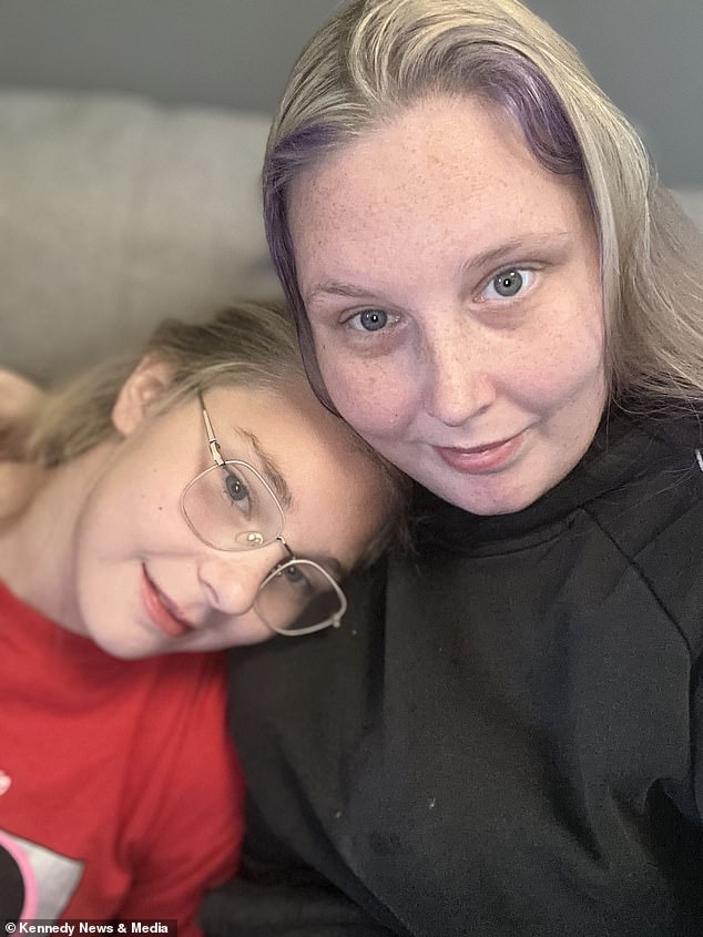The distraught youngster has been the victim of bullying for the last three years, according to her mother Micha Robinson (right)