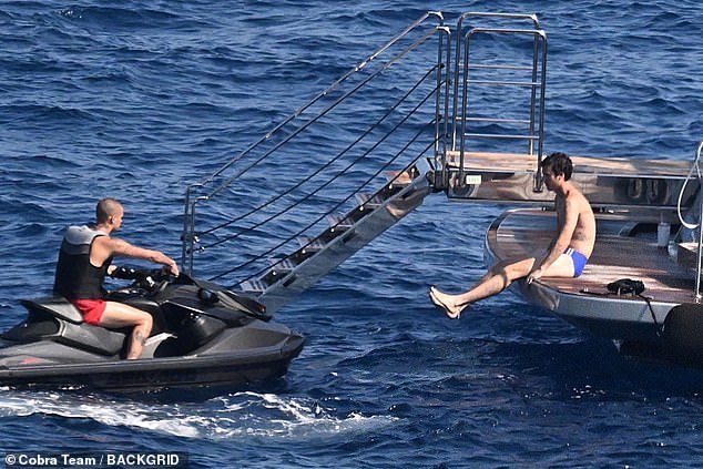 They were joined on their £16M superyacht by sons Cruz, 24, (L) Romeo, 22, (R) and daughter Harper, 14.
