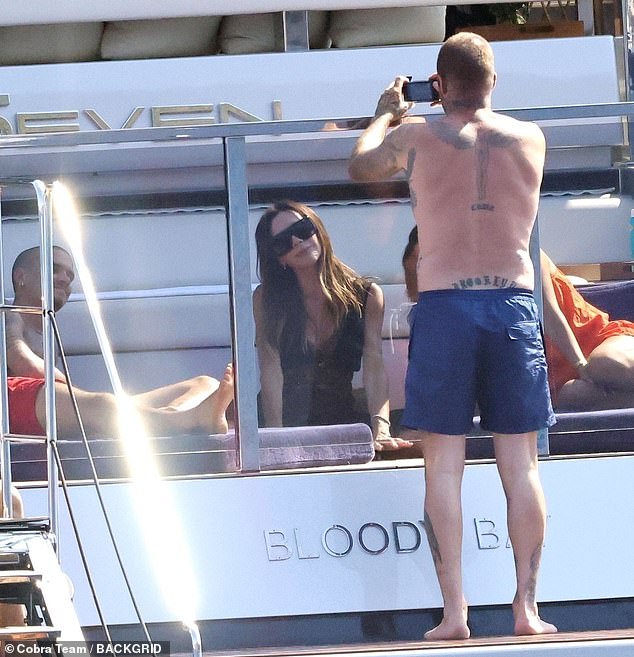 Later it was David's turn behind the camera and Victoria posed up a storm
