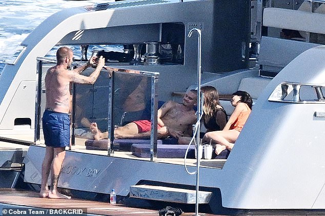 The Beckham's were also joined by Cruz's stunning girlfriend Jackie Apostel, 29 (far right)