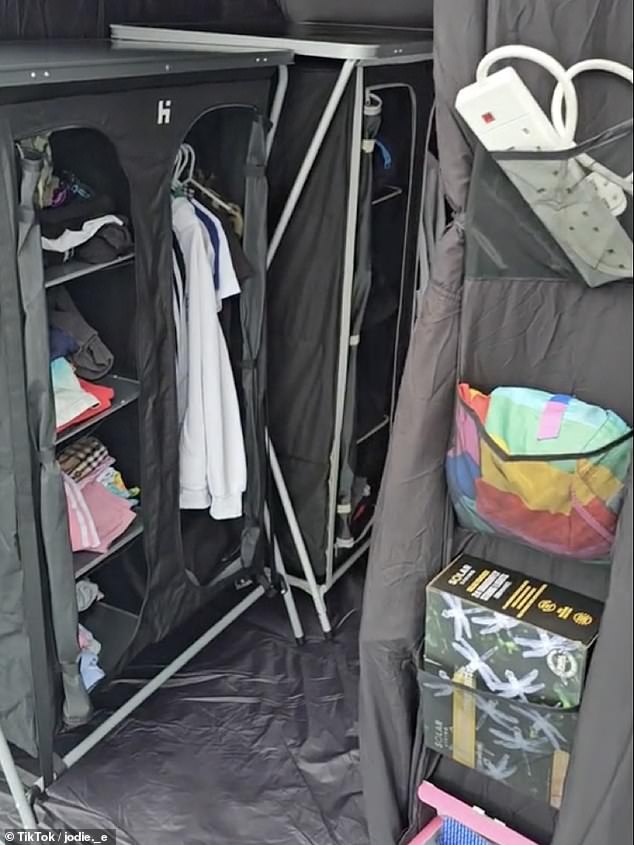 The family came fully prepared for their southern England holiday, packing a zip up wardrobe with several compartments and a hanging rail