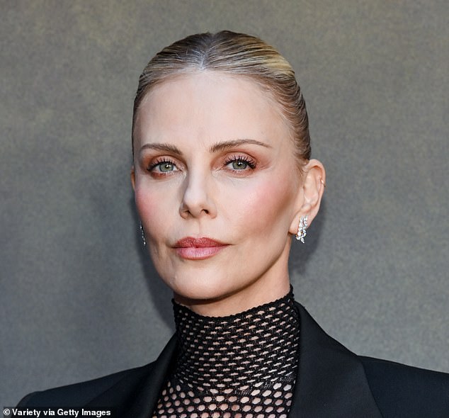 Actress Charlize Theron's motherhood journey began when she adopted Jackson, 11, in 2012 and daughter August, seven, in 2015 (seen in LA in 2025)