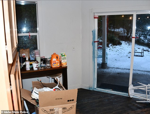 The back sliding door leading out of the kitchen was open and marked by police when they arrivved on the scene