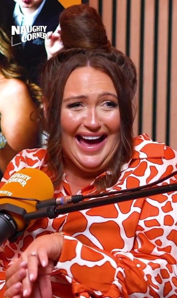 Charlotte Dawson laughing while speaking into a microphone.