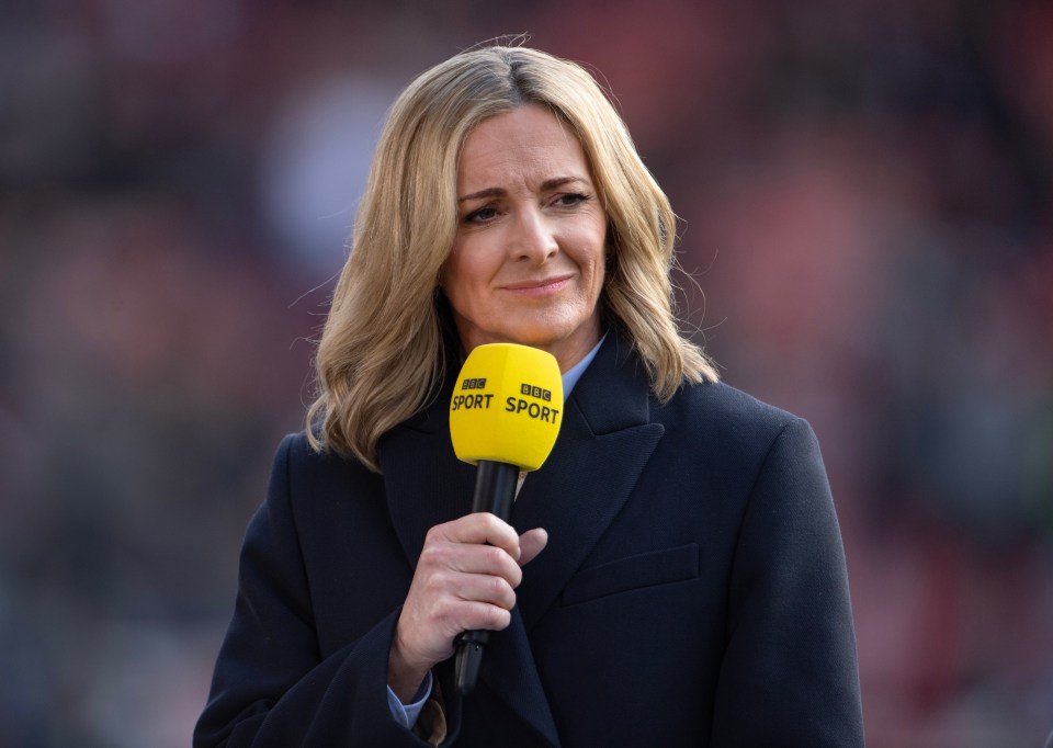Gabby Logan, BBC Sport presenter, holding a microphone.
