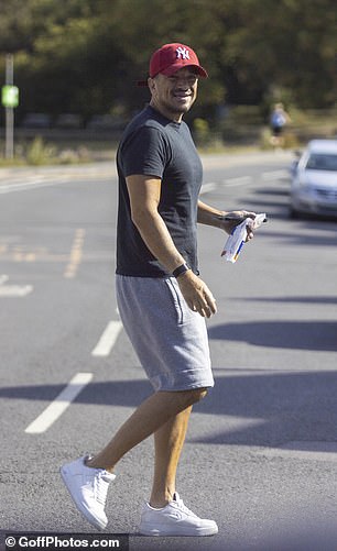 The hitmaker sported a black T-shirt along with light grey shorts and a pair of white trainersw for the outing