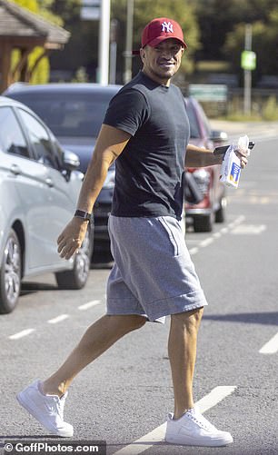 The Mysterious girl singer, 52, cut a casual figure as he picked up a perscription