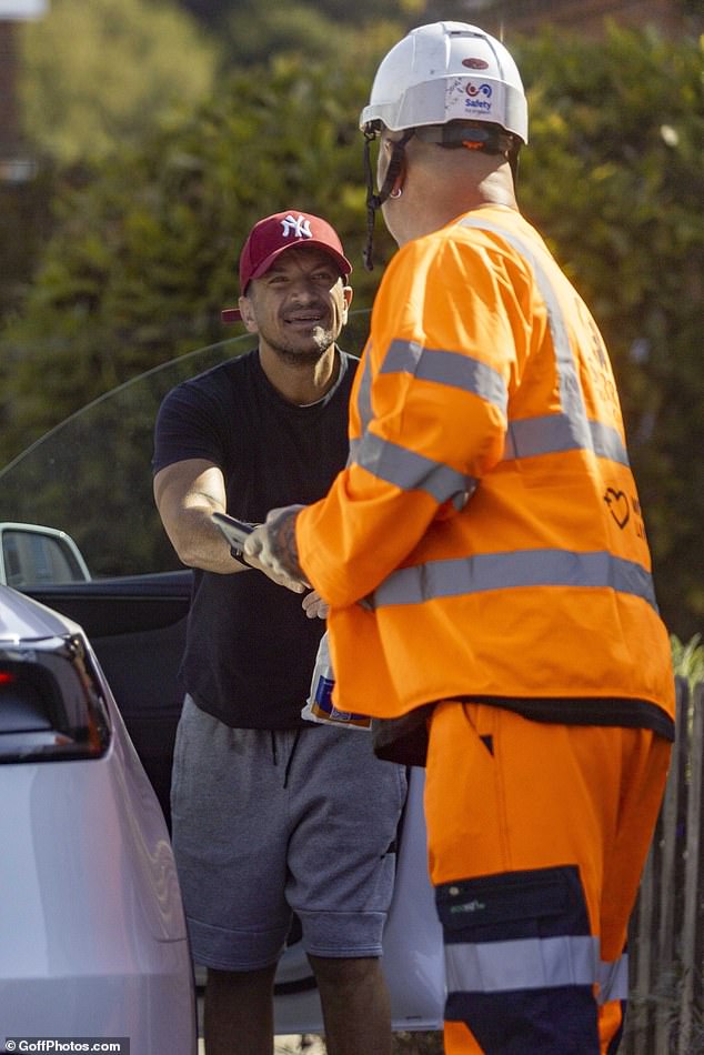 Peter appeared to chat with a local construction worker