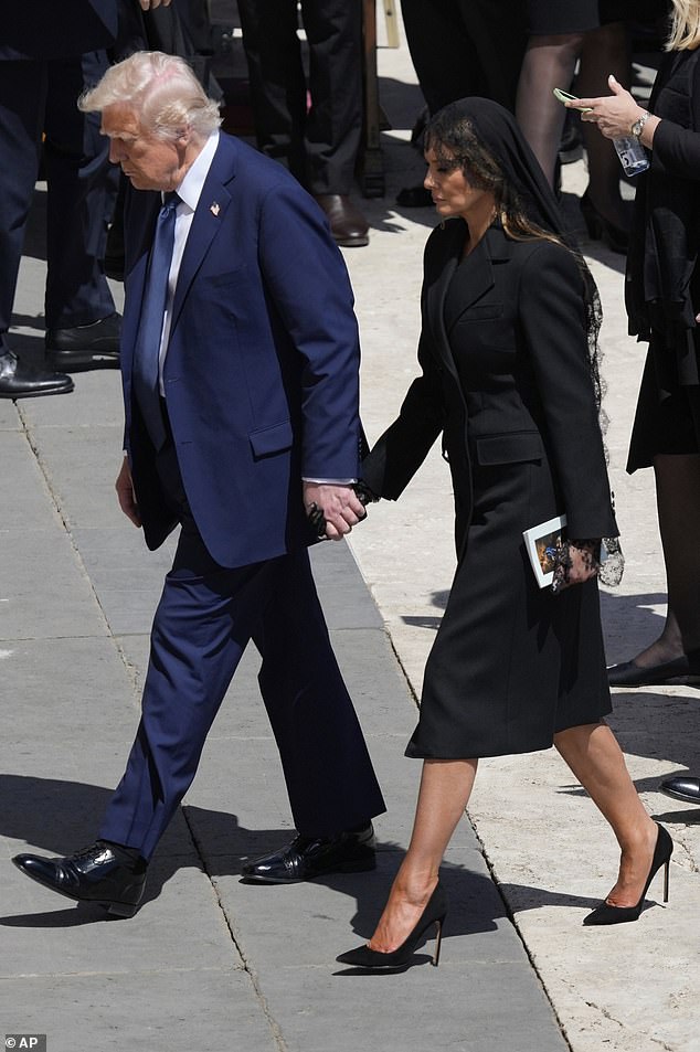 Another source close to the couple's inner circle said: 'There is a possibility that [Trump] is reaching for Melania for both emotional and physical stability. The president is getting older. His gait is not as steady.' (Pictured: Melania and Trump at the funeral of Pope Francis in April).