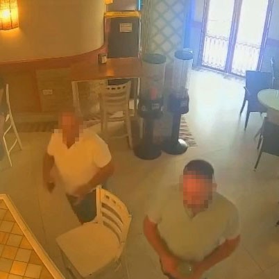 CCTV footage of a man setting fire to a cafe.