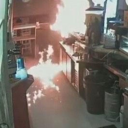 CCTV footage of a cafe fire started by a man after being denied mayonnaise.