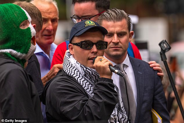 Kneecap singer, Liam Óg Ó hAnnaidh is currently facing terrorism charges after he allegedly held up a Hezbollah flag at a London gig last year