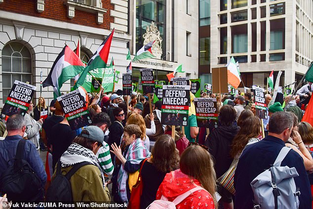 Crowds of protesters gather outside Westminster Magistrates Court in support of Mo Chara of the Irish hip hop group Kneecap