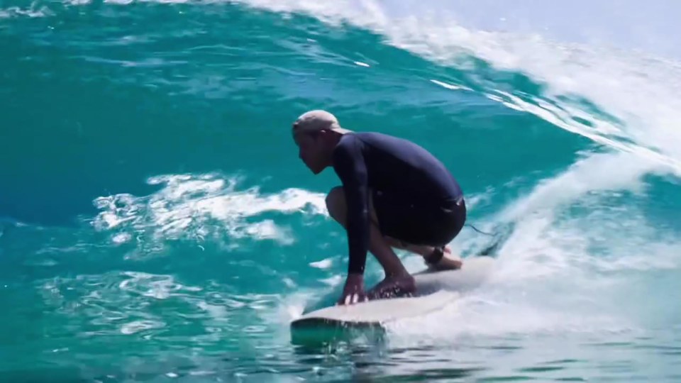 Prince Harry surfing.