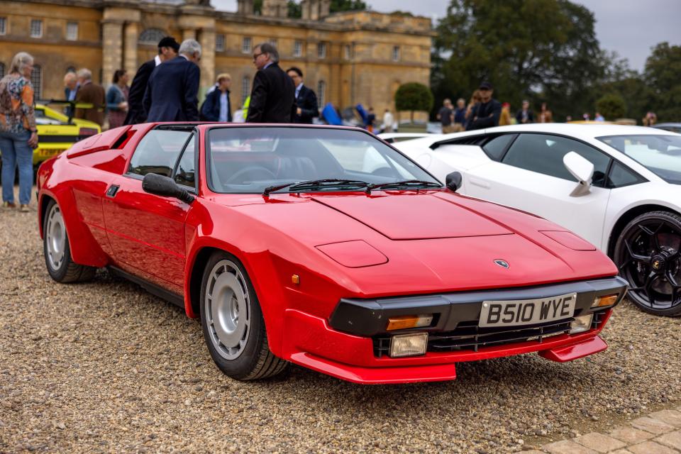 Red 1984 Lamborghini Jalpa at a car show.