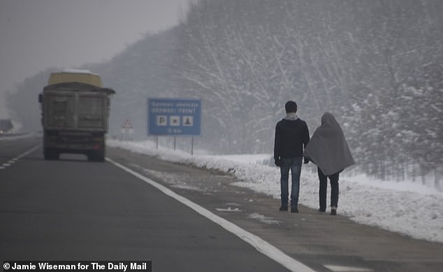 Two migrants from the Adasevci migrant camp, a motorway hotel-turned-hostel for some of the thousands stuck in Serbia unable to cross the nearby border into Croatia in 2018