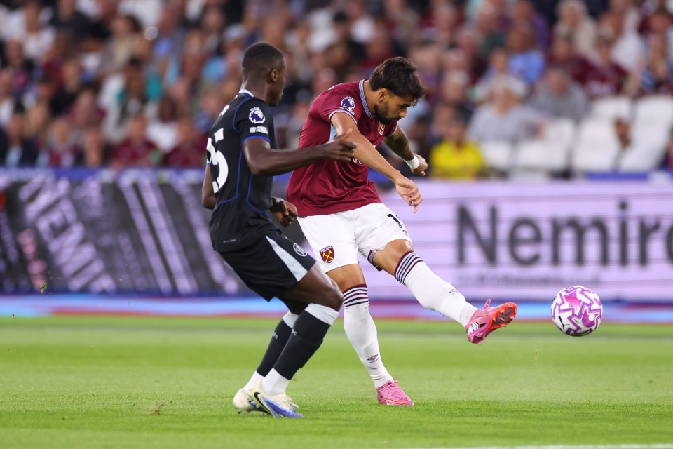 Lucas Paqueta of West Ham United kicking a soccer ball.