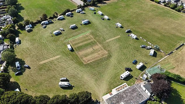 A shot of the ground shows the tyre marks after the group repeatedly drove over the outfield