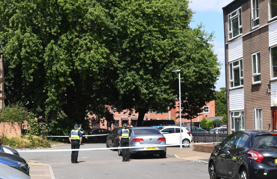 Police officers at a crime scene.