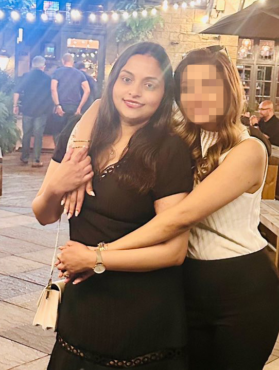 Photo of Nirodha Niwunhella with a friend.