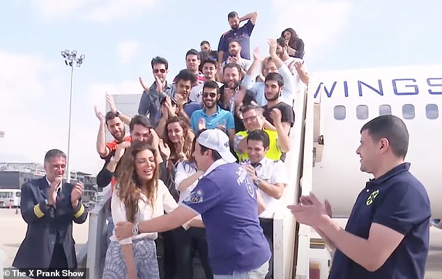 But upon landing, she is greeted by the smug host who revealed she is being pranked
