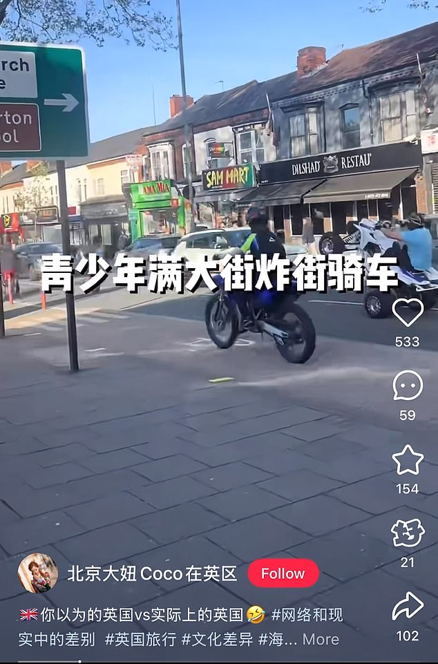 The moment of youth: Beijing Coco shows a video of a biker doing a wheelie while mid-riding